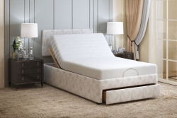 Dorchester Double bed with head raised and feet flat with the drawer open at the foot of the bed