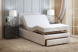 Dorchester Double bed with head and feet raised with the drawer open at the foot of the bed